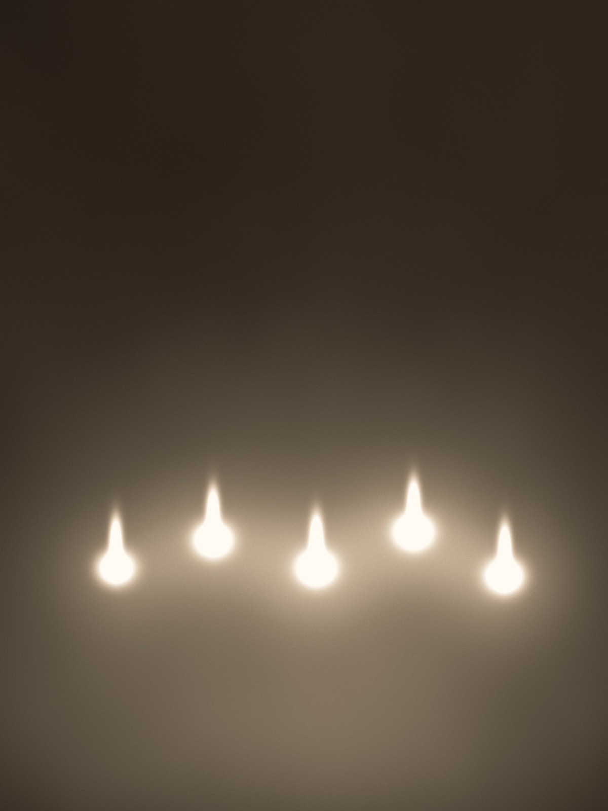 A drawn placeholder plate: five candle flames burning low across a dark warm room, rendered in the Halflight palette.